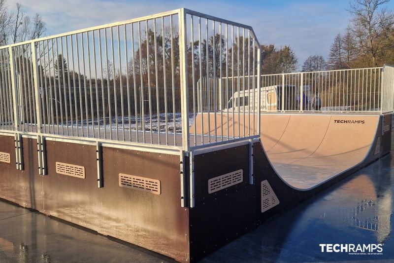 Wooden miniramp at skatepark in Trzcianka